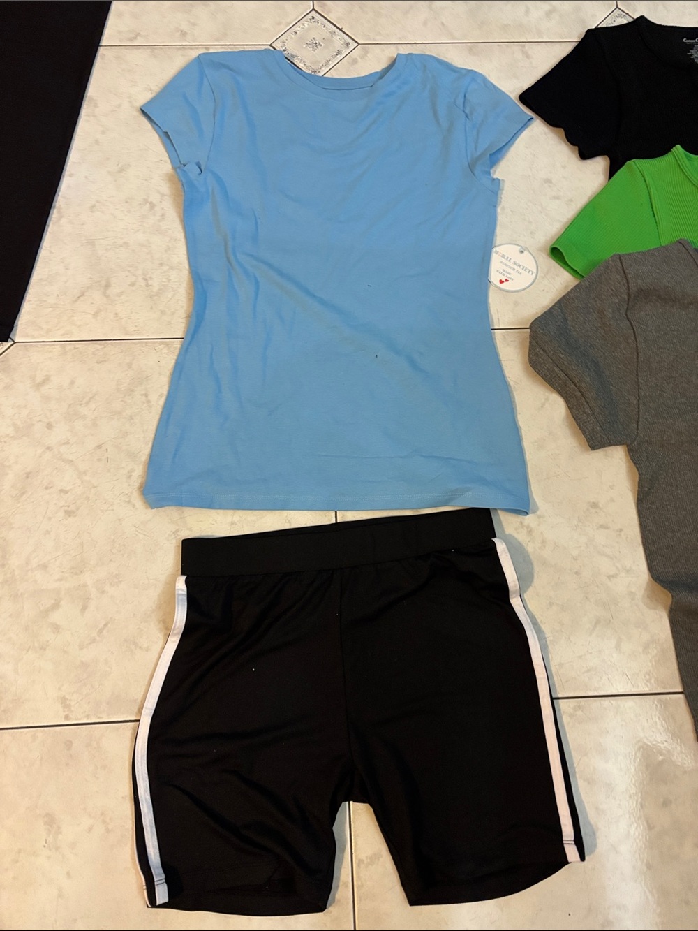 Light Blue Girls' Short Sleeve Tee and black shorts by Feathers